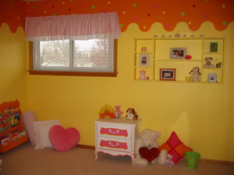 My mother-in-law sewed the valance as well as the square and cylinder pillow below the window out of extra sheets I purchased